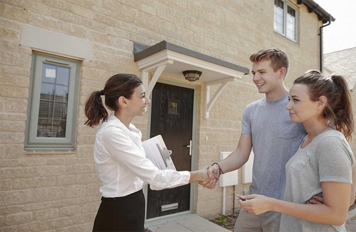Couple meeting a real estate agent